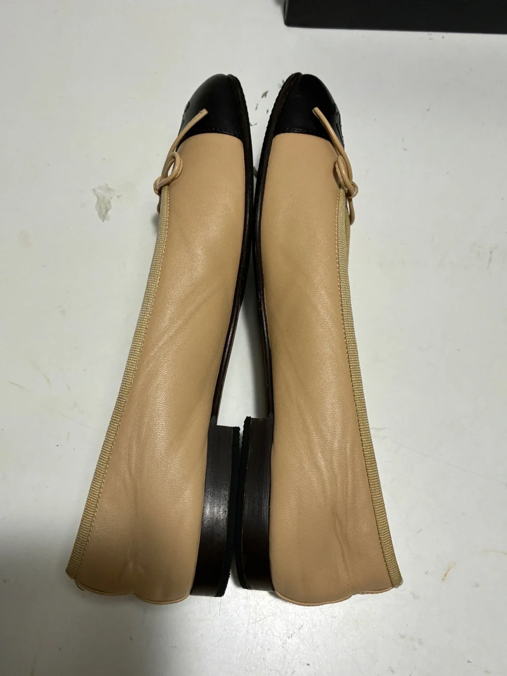 CHANEL Two-Tone Beige and Black Cap-Toe Ballet Flats